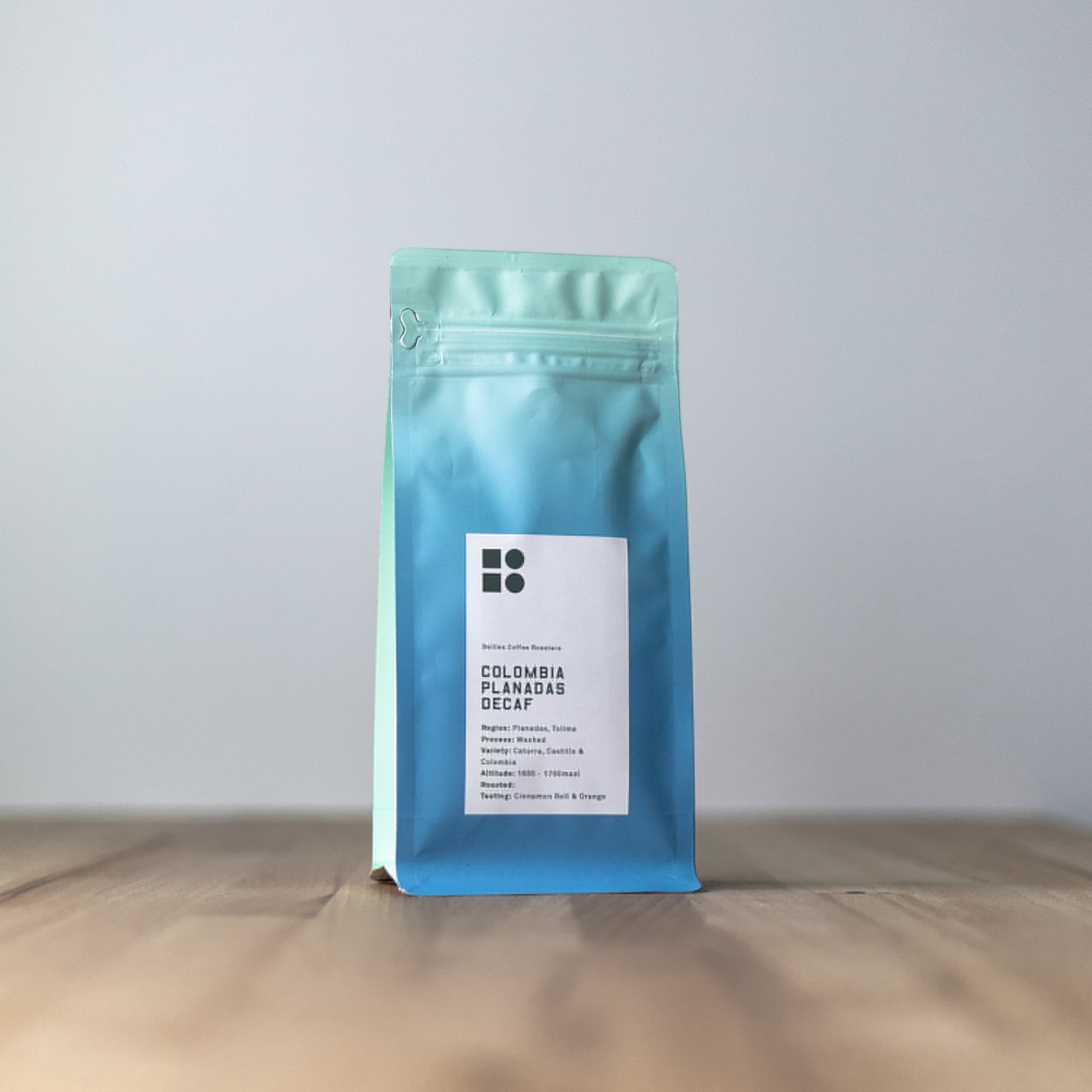 Decaf Colombia Planadas Tolima Washed - Bailies Coffee Roasters, Coffee beans, roasted in Belfast, local roastery creating speciality coffee, blue bag, white label, colombia